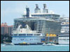 The Oasis next to Carnival's Biggest Ship